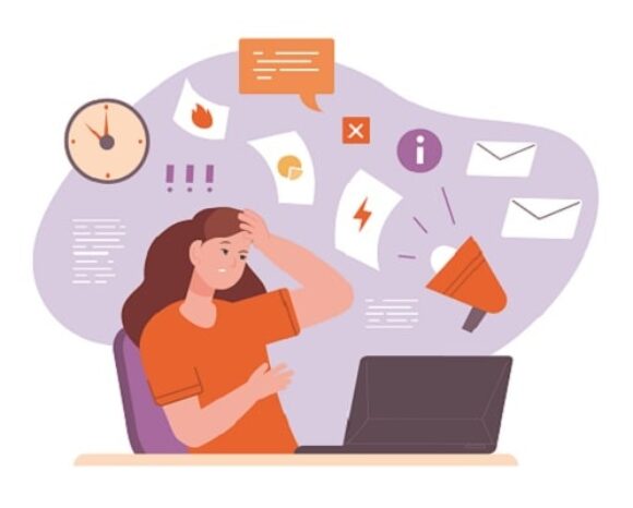 Frau ist gestresst am Arbeitsplatz wegen E-Mail-Flut.