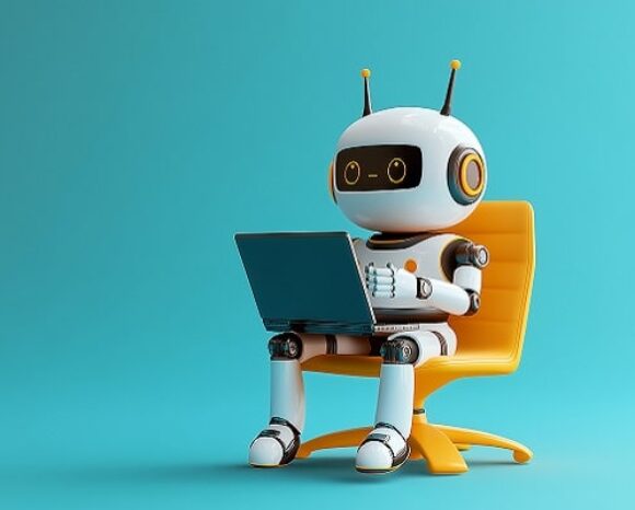 Roboter, der eine Künstliche Intelligenz darstellen soll, sitzt auf einem Stuhl und arbeitet am Laptop und stürzt HR in eine Identitätskrise.