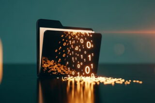 Zahlen in goldener Farbe fließen aus einer digitalen Akte